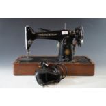 A vintage Singer electric sewing machine