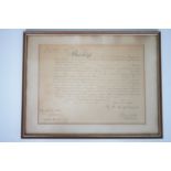 A 1917 British Army commission document, that of Albert Edward Martin, framed and mounted under