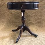 A reproduction mahogany drum table, 50 x 59 cm high