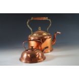 Two copper kettles, 28 cm and 15 cm respectively