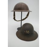 Two Second World War British steel helmets