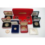 A quantity of QEII Isle of Man cased proof coins