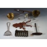 Collectors' items, including a Smith and Wellstood boot jack, a piano tuning key, and electroplate