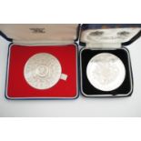 Two royal commemorative silver medallions, including a cased Royal Mint Elizabeth II Silver