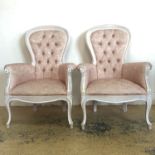 A pair of French style spoon back armchairs with pink brocade upholstery