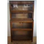 A 1930s Globe Wernicke type four-section oak bookcase by Gunn