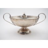 A Liberty of London electroplate silver table centrepiece, the shallow planished bowl being cusped