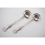 A pair of Victorian provincial silver Queen's pattern sauce ladles, engraved with the letter 'L' to