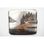 A 20th Century white metal cigarette case, with niello type decoration depicting a Japanese vista,