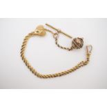 A Victorian high carat yellow-metal "Albertina" watch chain, with heart-shaped charm, T-bar,