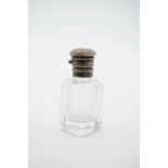 A Victorian white-metal mounted miniature cut glass scent / perfume bottle, having a hinged cap,