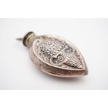A Victorian lady's white-metal chatelaine scent bottle, of teardrop form, with heart shaped recess