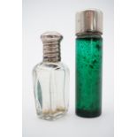 Two antique scent bottles, one of silver-mounted emerald glass, Birmingham, 1903, together with