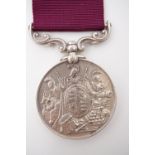 An Army Long Service and Good Conduct medal engraved to 1034 Sergt T Wilde Durh L I