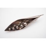 A Victorian silver lily-of-the-valley brooch, Arthur Johnson Smith, Chester, 1913, 2.7g, in period