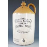 A stoneware Taylor's patent "tap jar", transfer-printed "The Improved Save-All Self-Venting Tap Jar,