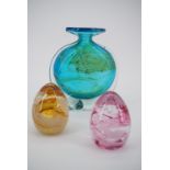 A Mdina studio vase and two paperweights