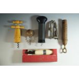 Corkscrews, a bottle opener and a vintage Sparklets "Cork Master"