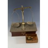 A set of Allen and Hawburys Ltd of London beam scales and weights