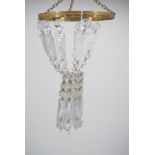 A cut glass chandelier, circa 1930s-1950s