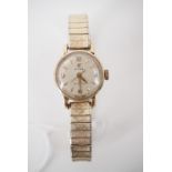 A 1960s lady's 9ct gold Cyma "Cymaflex" wrist watch, having a manual wind movement and plated