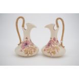 A pair of late 19th Century European Art Nouveau porcelain miniature ewers, 13 cm