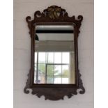 A quality reproduction 18th Century parcel-gilt mahogany fret mirror with Ho-ho bird crest, 78 x