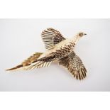 A silver gilt brooch modelled in the form of a pheasant, retailed by Bruford and Carr, 10.6g