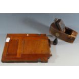 An antique chemist's desk seal, wooden block plane and camera plate holder