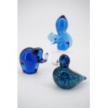 Three Wedgwood animal glass paperweights; a duck, an elephant and a squirrel