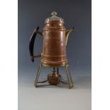 A copper coffee percolator and stand
