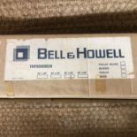 A Bell & Howell tripod screen