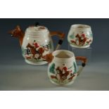 A tea set decorated with fox hunting scenes