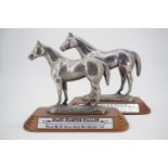 Two cast "Grand Champion Stallion" horse sculptures