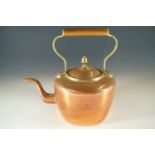 A copper kettle, 26 cm