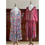A 1980s Frank Usher polyester summer dress, printed with painterly roses, wrap style, with pleated