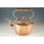 A copper kettle, 23 cm