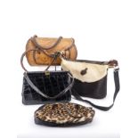 Vintage handbags including a 1960s cowhide shoulder bag, a vintage dyed coney fur handbag in the