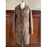 A vintage Baily's of Glastonbury sheepskin coat, with stepped collar, leather covered buttons and