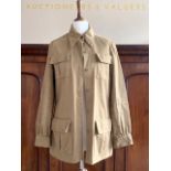 A 1970s lady's Sybil Zelker for Polly Peck safari jacket, size 12, together with a Fink Model