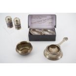 A pair of boxed nickel silver salt cellars and a tea strainer etc.