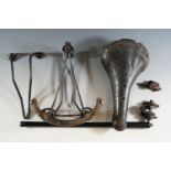 A quantity of vintage bicycle parts and accessories including a leather saddle