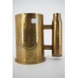 A large trench art tankard fabricated in part from a post-War 105mm artillery shell case, 18 cm x 11