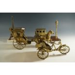 Brass ornaments modelled respectively as a tricycle rickshaw, a horse and carriage, and a car,