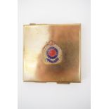 A Second World War Zenette powder compact bearing an enamelled Royal Engineers badge