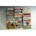 A quantity of "Football Picture Story Monthly" comic books