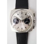 A 1960s Breitling Top Time wrist watch, having "panda" face, (running)