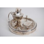 A George V smoker's silver table compendium, marks rubbed, London, 1912, loaded, 13 cm diameter, 8