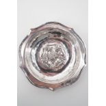 A Keswick School of Industrial Arts silver dish, with cusped rim and repousse moulded decoration