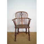 A late 18th / early 19th Century yew and elm Windsor armchair